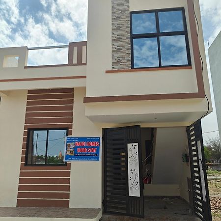 Nandi Homes Homestay Ujjain Bagian luar foto